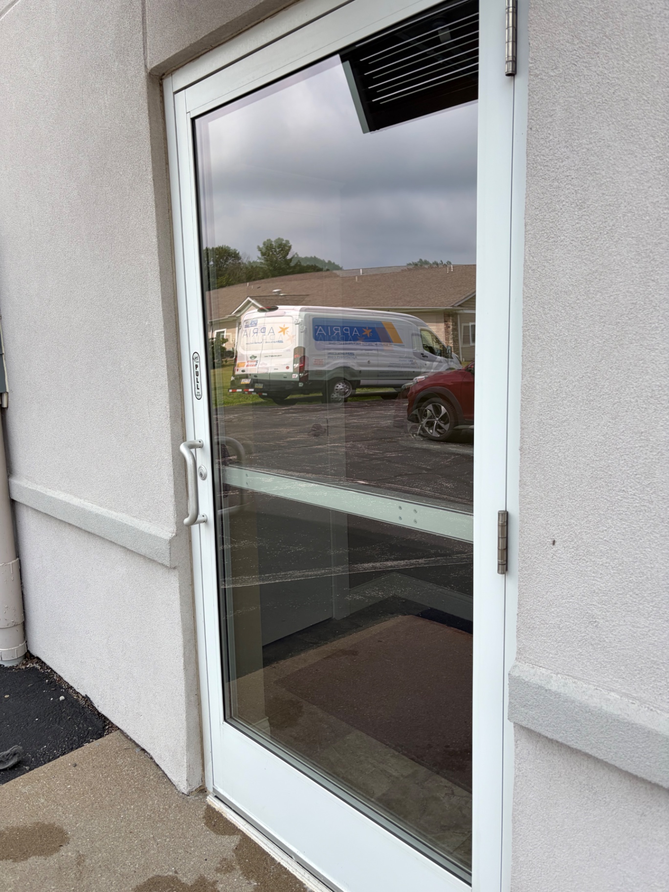 Freshly cleaned commercial glass entry door